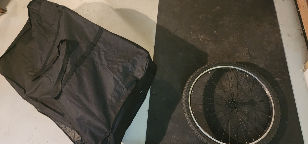 Photo of the bike bag and a bike tire