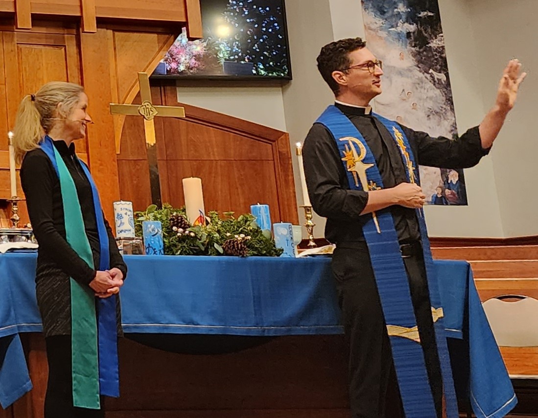 Photo of United Church minister Simon leSieur wearing a clergical stole