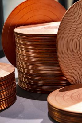 Stack of copper plates - art by Sonny Assu